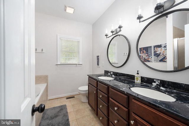 326 Anna Highview, Bumpass, VA 23024 - bathroom with baseboards, tile patterned floors, double vanity, toilet, and a tub