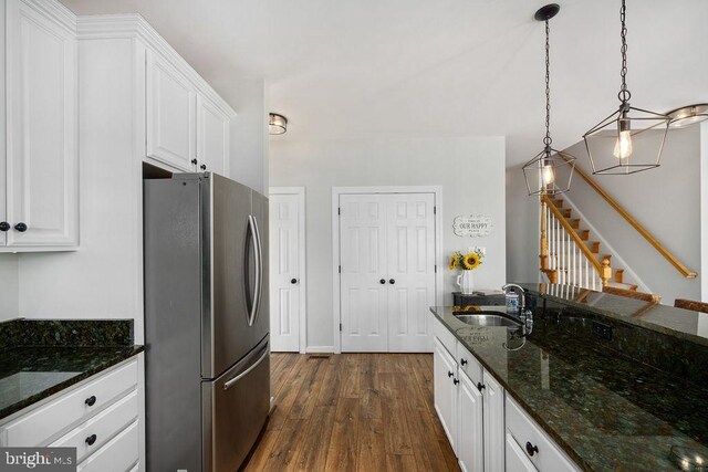 326 Anna Highview, Bumpass, VA 23024 - kitchen featuring freestanding refrigerator, a sink, dark wood-type flooring, and white cabinets