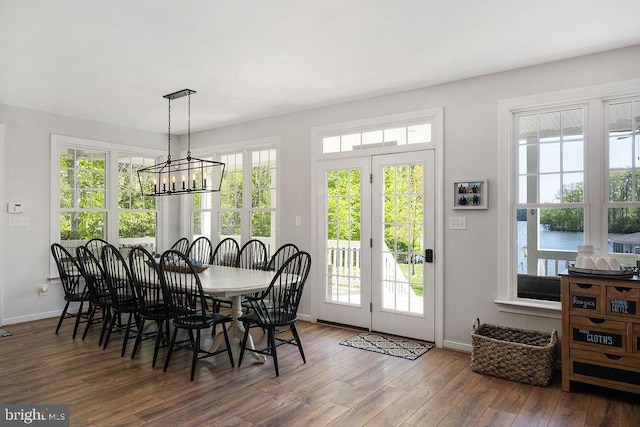 326 Anna Highview, Bumpass, VA 23024 - dining area featuring wood finished floors, baseboards, and healthy amount of natural light
