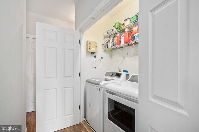 326 Anna Highview, Bumpass, VA 23024 - laundry area with washer and dryer and wood finished floors