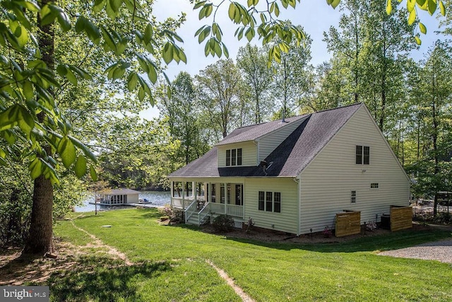 326 Anna Highview, Bumpass, VA 23024 - back of property featuring covered porch, a yard, and a shingled roof