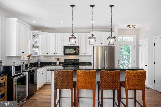 326 Anna Highview, Bumpass, VA 23024 - kitchen featuring black appliances, open shelves, dark wood-style flooring, white cabinetry, and dark countertops