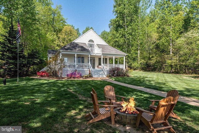 326 Anna Highview, Bumpass, VA 23024 - rear view of property with covered porch, a fire pit, and a yard