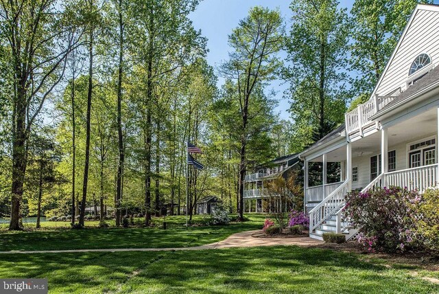 326 Anna Highview, Bumpass, VA 23024 - view of grassy yard featuring a balcony