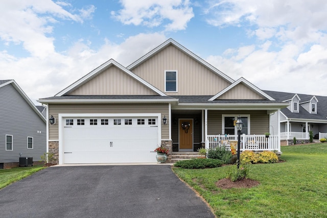133 Lake View Cir, Waynesboro, VA 22980 - craftsman inspired home featuring board and batten siding, covered porch, driveway, a front lawn, and stone siding