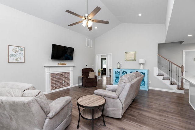 133 Lake View Cir, Waynesboro, VA 22980 - living room with a ceiling fan, stairs, dark wood finished floors, high vaulted ceiling, and a tiled fireplace