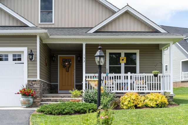 133 Lake View Cir, Waynesboro, VA 22980 - view of exterior entry featuring board and batten siding, covered porch, stone siding, and roof with shingles