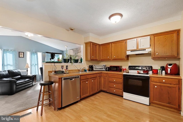 kitchen with electric stove, dishwasher, under cabinet range hood, open floor plan, and brown cabinets