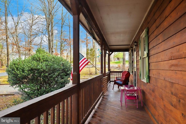 wooden deck featuring a porch