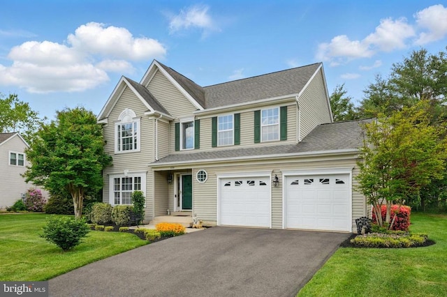 traditional home with asphalt driveway, a front lawn, an attached garage, and a shingled roof