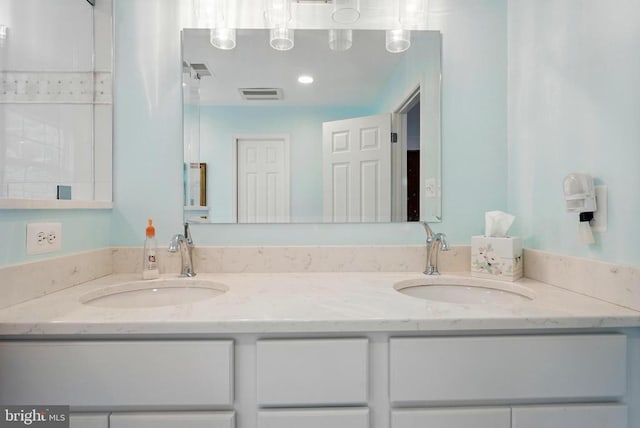 bathroom with double vanity