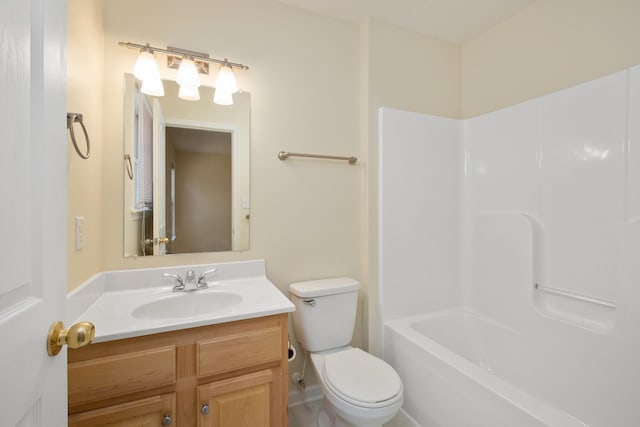 bathroom with toilet and vanity