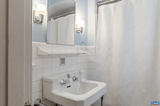 3220 Longdale Furnace Rd, Clifton Forge, VA 24422 - full bath featuring a sink, tile walls, and a shower with curtain