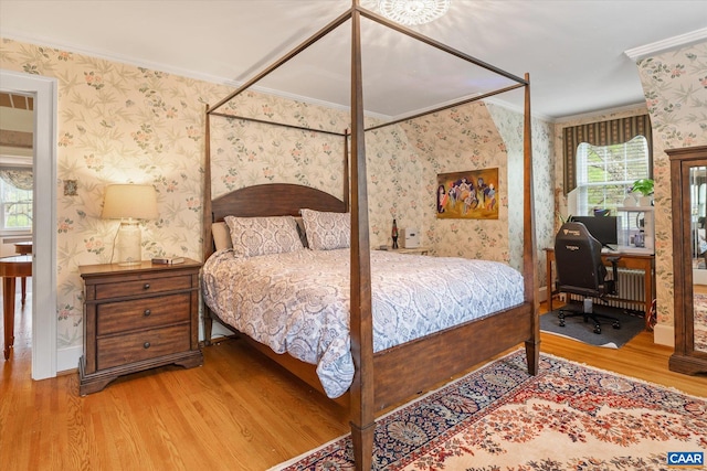3220 Longdale Furnace Rd, Clifton Forge, VA 24422 - bedroom featuring wood finished floors, wallpapered walls, ornamental molding, an office area, and baseboards