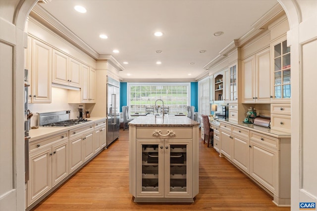 3220 Longdale Furnace Rd, Clifton Forge, VA 24422 - kitchen with appliances with stainless steel finishes, ornamental molding, an island with sink, light wood-type flooring, and recessed lighting