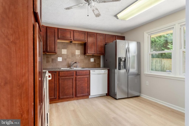 2 Short Cir, Fredericksburg, VA 22407 - kitchen with dishwasher, stainless steel fridge, a sink, light wood-type flooring, and ceiling fan