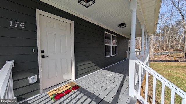 176 Tussing Ln, Rochelle, VA 22738 - doorway to property featuring covered porch and a lawn