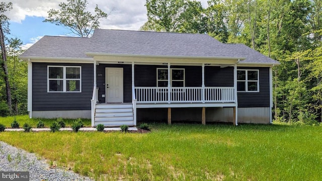 176 Tussing Ln, Rochelle, VA 22738 - view of front facade featuring a porch, a front yard, and a shingled roof