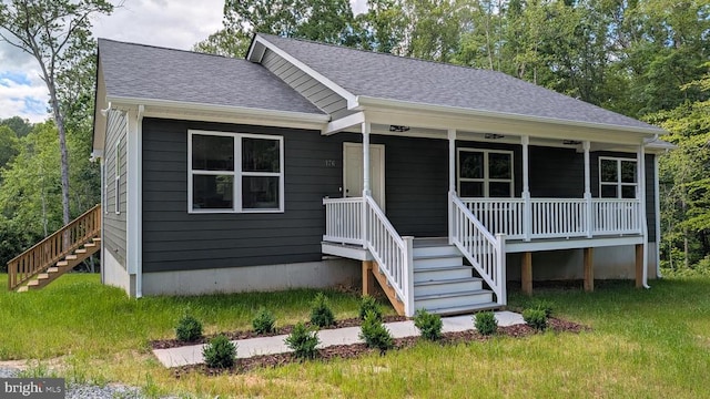 176 Tussing Ln, Rochelle, VA 22738 - view of front of property with stairs, covered porch, a shingled roof, and a front lawn