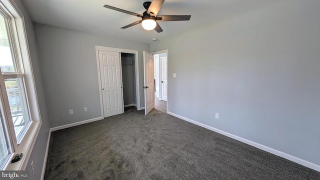 176 Tussing Ln, Rochelle, VA 22738 - unfurnished bedroom featuring baseboards, carpet flooring, a closet, and a ceiling fan