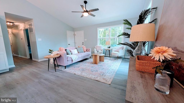 176 Tussing Ln, Rochelle, VA 22738 - living room featuring vaulted ceiling, wood finished floors, ceiling fan, and baseboards
