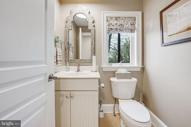 87 River Bend Rd E, Fredericksburg, VA 22407 - bathroom with toilet, baseboards, vanity, and tile patterned flooring