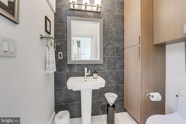 87 River Bend Rd E, Fredericksburg, VA 22407 - bathroom with tile walls, toilet, and tile patterned floors