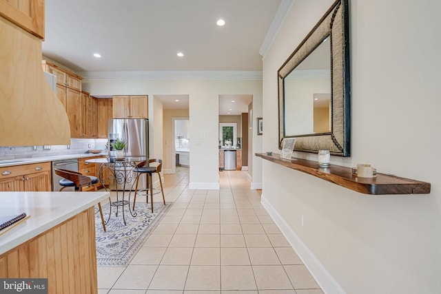 87 River Bend Rd E, Fredericksburg, VA 22407 - kitchen with appliances with stainless steel finishes, light tile patterned floors, tasteful backsplash, ornamental molding, and recessed lighting