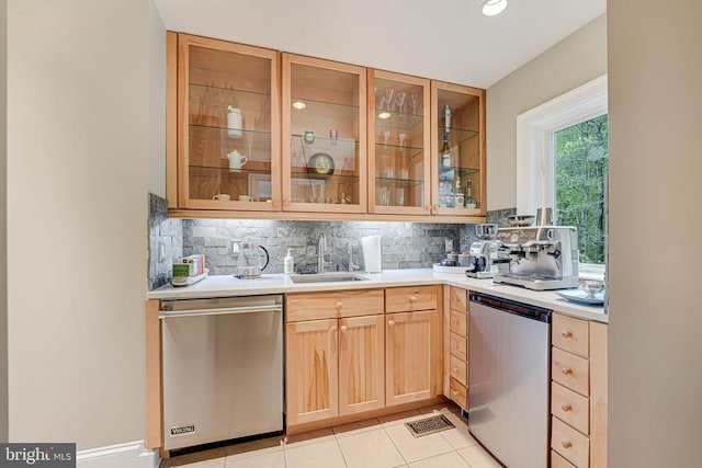 87 River Bend Rd E, Fredericksburg, VA 22407 - bar area featuring stainless steel dishwasher, a sink, tasteful backsplash, light tile patterned floors, and fridge