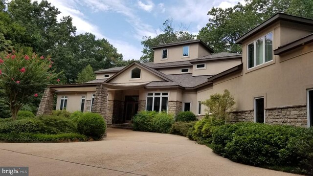 87 River Bend Rd E, Fredericksburg, VA 22407 - view of front of home with stone siding and stucco siding