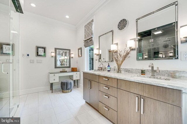 87 River Bend Rd E, Fredericksburg, VA 22407 - full bathroom featuring a shower stall, double vanity, baseboards, crown molding, and recessed lighting