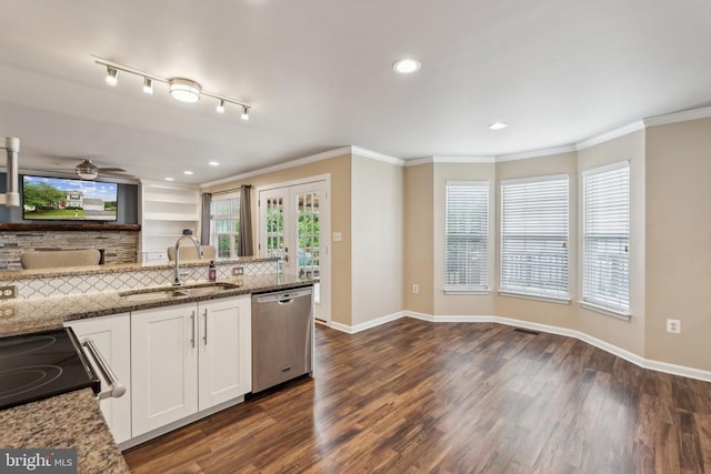 6215 Hot Spring Ln, Fredericksburg, VA 22407 - kitchen featuring dishwasher, a sink, dark stone countertops, white cabinets, and ornamental molding