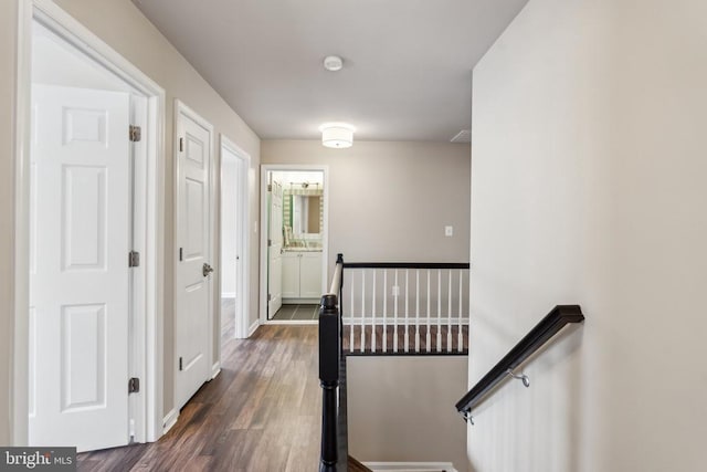6215 Hot Spring Ln, Fredericksburg, VA 22407 - hall featuring an upstairs landing, dark wood-style floors, and baseboards