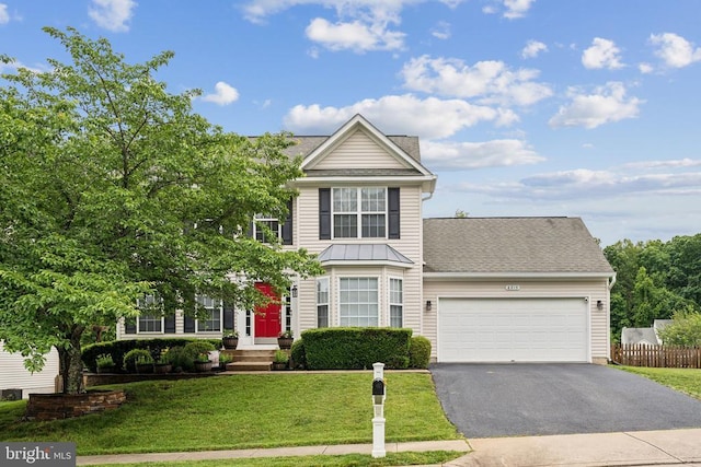6215 Hot Spring Ln, Fredericksburg, VA 22407 - traditional-style house with a garage, driveway, and a shingled roof