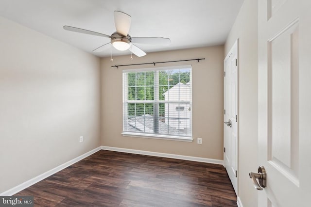 6215 Hot Spring Ln, Fredericksburg, VA 22407 - empty room featuring dark wood-style flooring, baseboards, and a ceiling fan