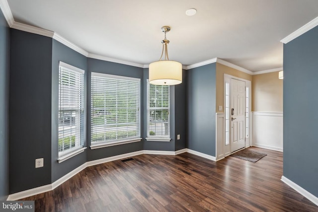 6215 Hot Spring Ln, Fredericksburg, VA 22407 - unfurnished dining area with dark wood-type flooring, crown molding, and baseboards