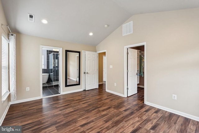 6215 Hot Spring Ln, Fredericksburg, VA 22407 - unfurnished bedroom with dark wood-type flooring, a walk in closet, baseboards, multiple windows, and recessed lighting