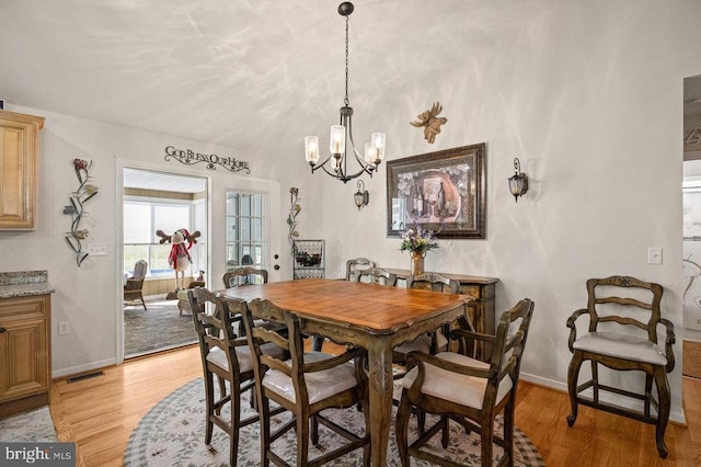 53 Arthur Ln, Luray, VA 22835 - dining room featuring baseboards, a chandelier, and light wood-style floors