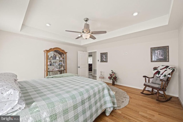 53 Arthur Ln, Luray, VA 22835 - bedroom featuring a raised ceiling, light wood-style floors, baseboards, recessed lighting, and ceiling fan