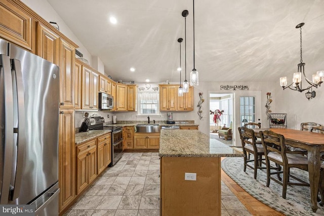 53 Arthur Ln, Luray, VA 22835 - kitchen with appliances with stainless steel finishes, a sink, light stone countertops, a center island, and a chandelier