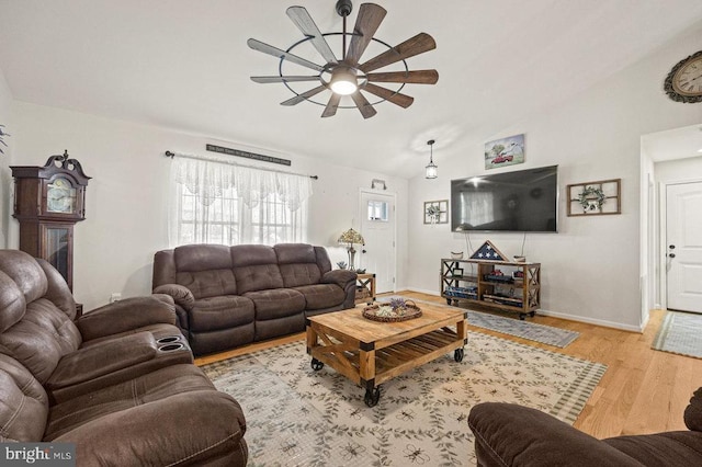 53 Arthur Ln, Luray, VA 22835 - living area featuring ceiling fan, wood finished floors, vaulted ceiling, and baseboards