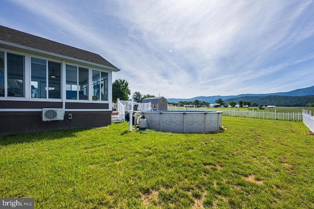53 Arthur Ln, Luray, VA 22835 - view of yard with a cooling unit, a mountain view, and a sunroom