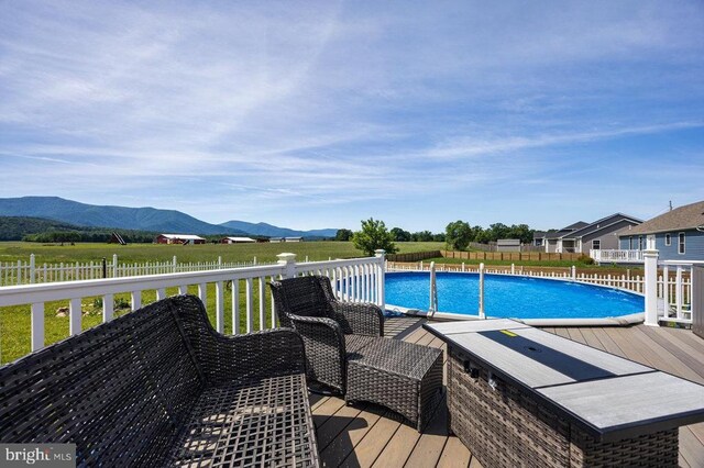 53 Arthur Ln, Luray, VA 22835 - view of swimming pool featuring a deck with mountain view