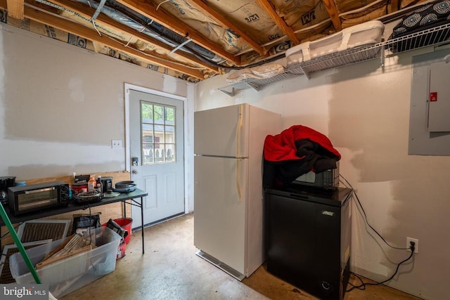 6506 Plantation Forest Dr, Spotsylvania, VA 22553 - below grade area featuring freestanding refrigerator and electric panel