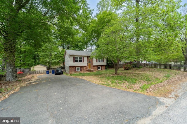 6506 Plantation Forest Dr, Spotsylvania, VA 22553 - view of front facade featuring asphalt driveway and brick siding