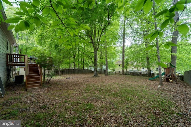 6506 Plantation Forest Dr, Spotsylvania, VA 22553 - fenced backyard with stairs, central AC, and a deck