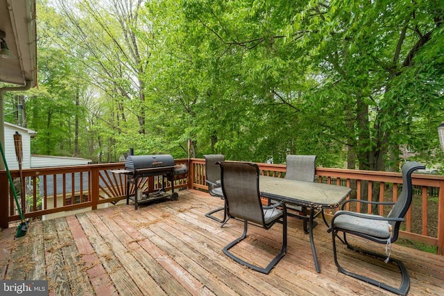6506 Plantation Forest Dr, Spotsylvania, VA 22553 - wooden terrace with outdoor dining area and area for grilling