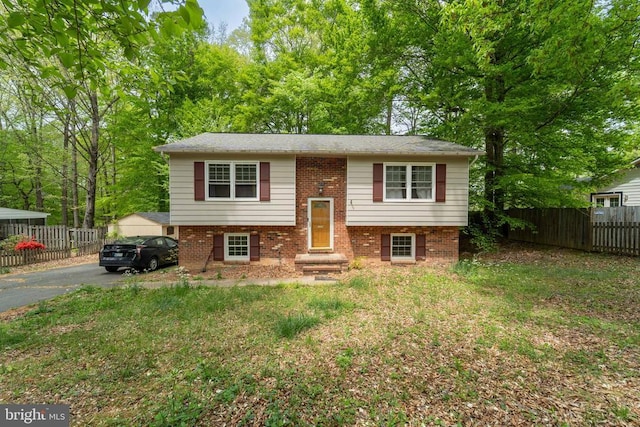 6506 Plantation Forest Dr, Spotsylvania, VA 22553 - split foyer home with asphalt driveway and brick siding