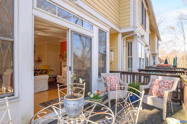 balcony featuring a sunroom