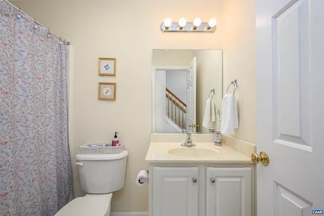 full bath with vanity and toilet